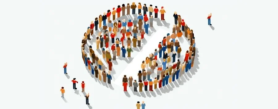 several people stand in a shape of a globe with a clear divide between them, representing the concept of buyer demographics